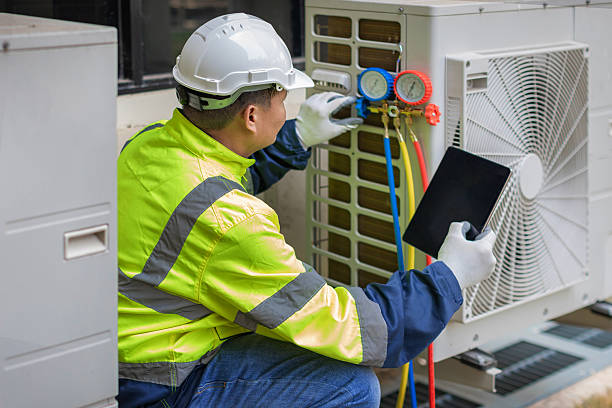 Professional Air Duct Cleaning technician working in Mc Fall, MO